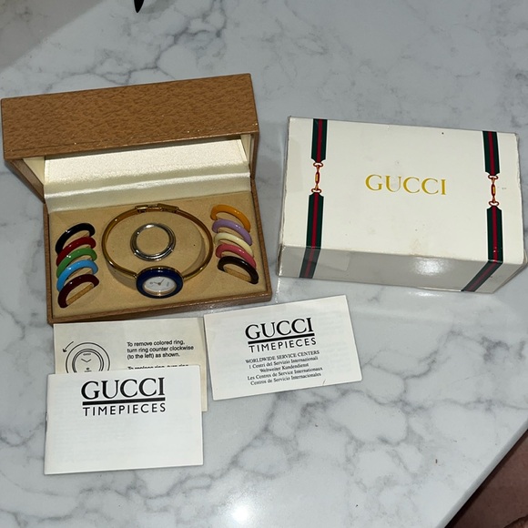 VINTAGE GOLD GUCCI WATCH WITH MULTI/INTERCHANGEABLE BEZELS - Picture 1 of 6